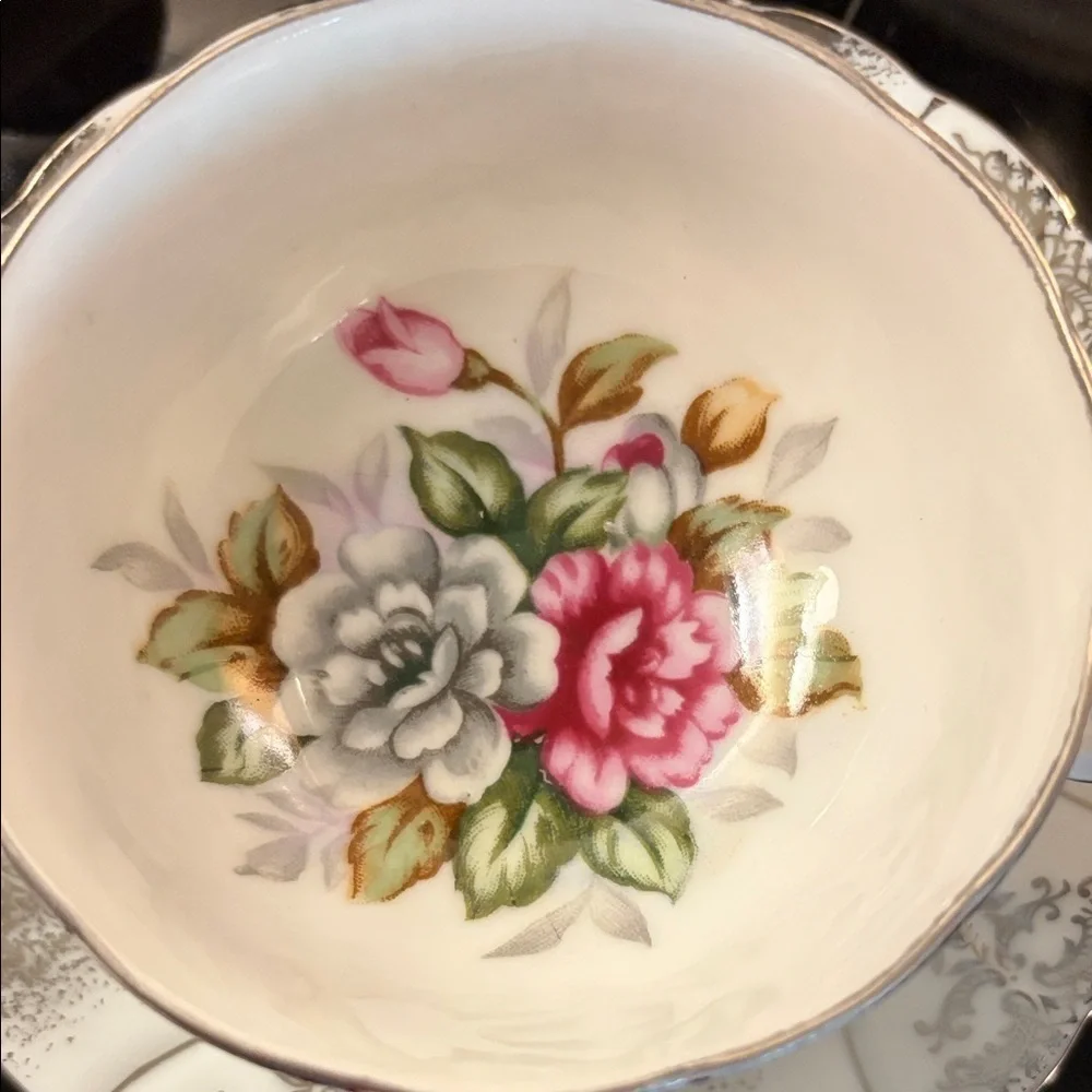 Vintage 3 footed tea cup made in Japan roses with silver guild. Rare!